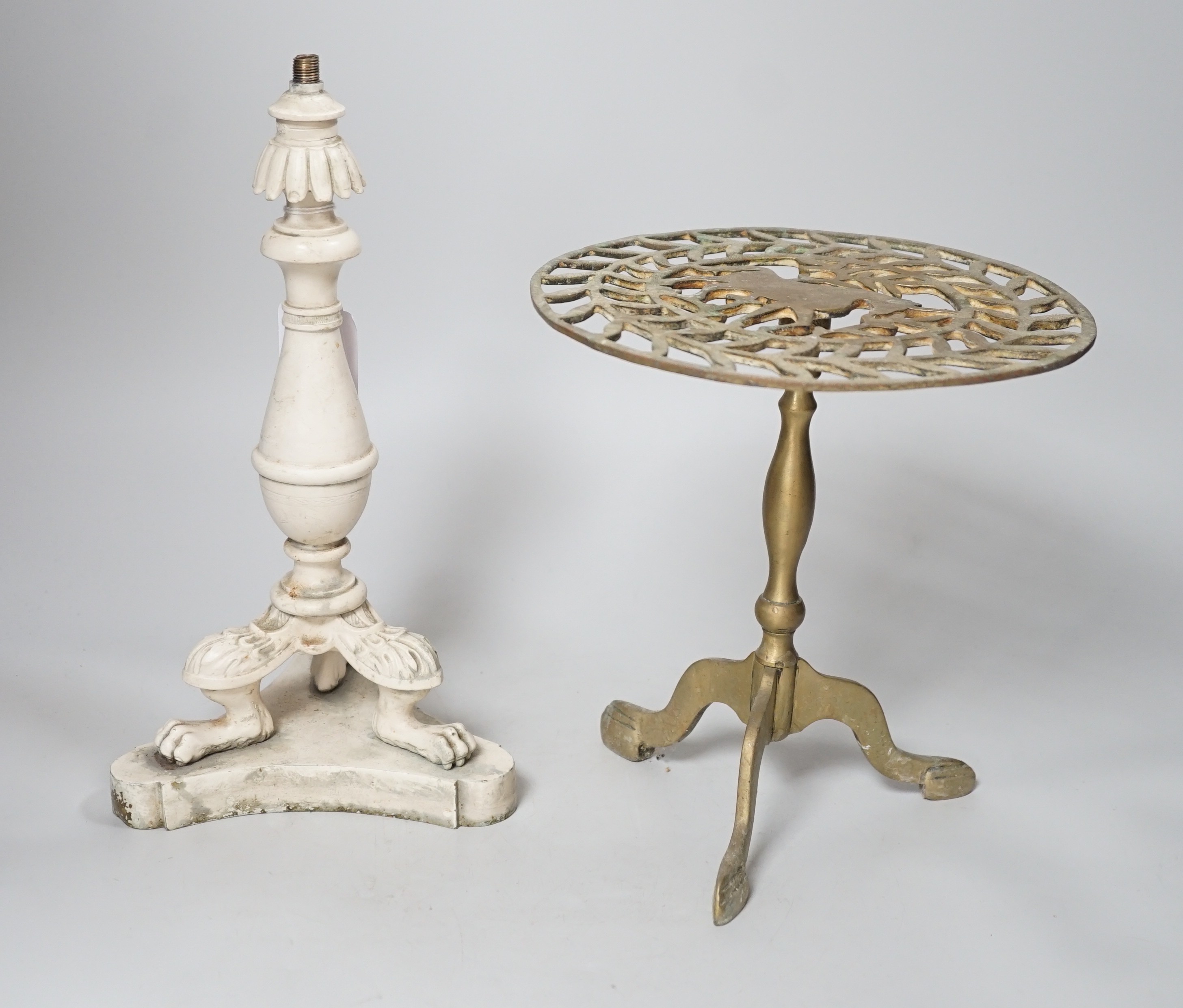 A painted bronze lamp stem and a brass trivet. Tallest 29cm